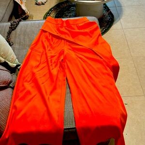 Tangerine colored suit that has palazzo pants in a size 6